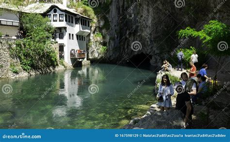 BLAGAJ, BOSNIA - April, 2019: Blagaj Tekija House in Cave Near River. Blagaj is Popular ...