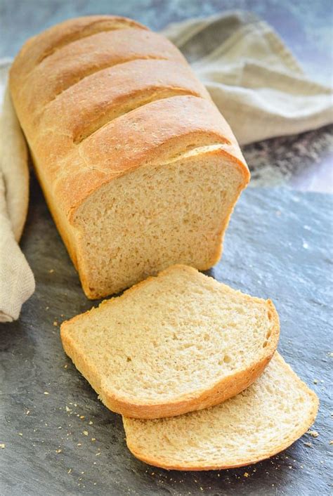 A super easy, 5 ingredient, Light Whole Wheat Bread recipe with very minimal hands on time & no ...