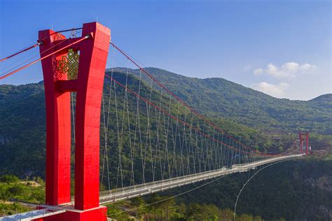 Glass Bridge in Huangchuan Three Gorges Scenic Area, China by UAD - 谷德设计网