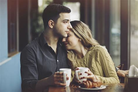 Couple in love drinking coffee in coffee shop | Couples, Couples in love, Dating pictures