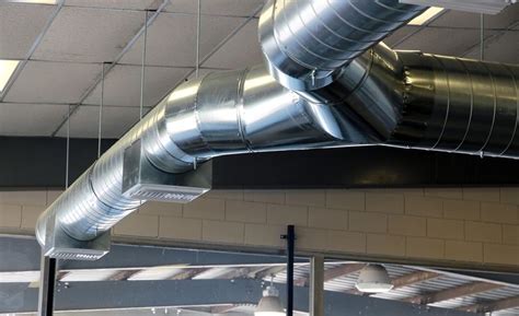 Exposed spiral ductwork | Sheet metal fabrication, Metal fabrication ...