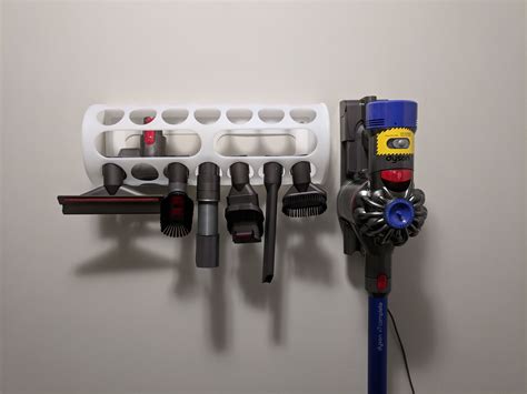 This $2 plastic bag holder from Ikea makes a great Dyson tools holder | Storage closet ...