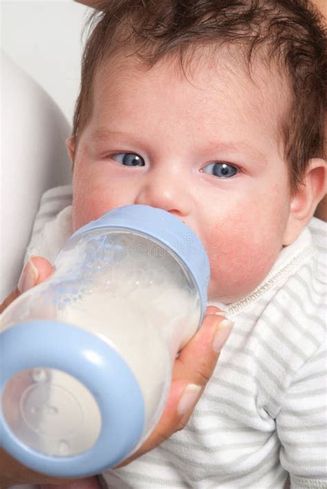 Baby Drinking Milk of Her Bottle Stock Photo - Image of food, life ...