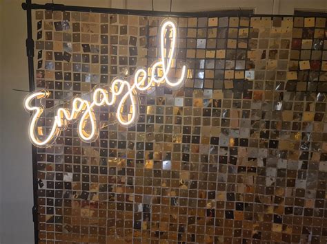 Engaged Neon Sign for Hire with backdrop – UpUpNAwayBalloons