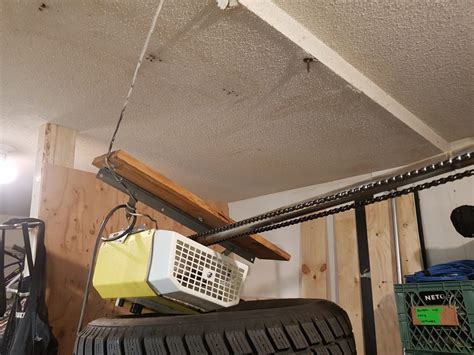 Vancouver Garage Motor Fell from Ceiling Mount after thirty years. - Access Garage Doors