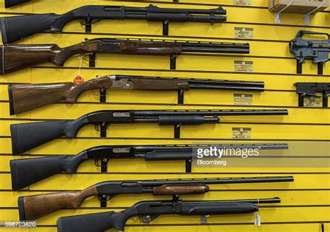 Various shotguns hang on a wall at ABQ Guns in Albuquerque, New... News Photo - Getty Images