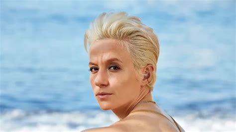 Watch Megan Rapinoe Take a Graceful Spill in the Water During Her SI Swimsuit Photoshoot