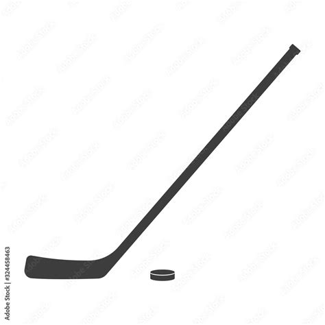 Ice hockey stick and puck icon or black silhouette isolated on white ...