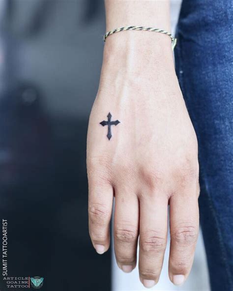 Share 77+ small cross hand tattoos - in.coedo.com.vn