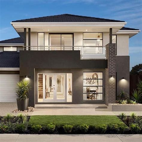 Unique and stunning Modern 2 story house is designed in a two tone exterior paint with white on ...