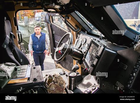 Jorge Morales-Lopez, representative of Lori Trahan, views the interior of the JLTV Stock Photo ...