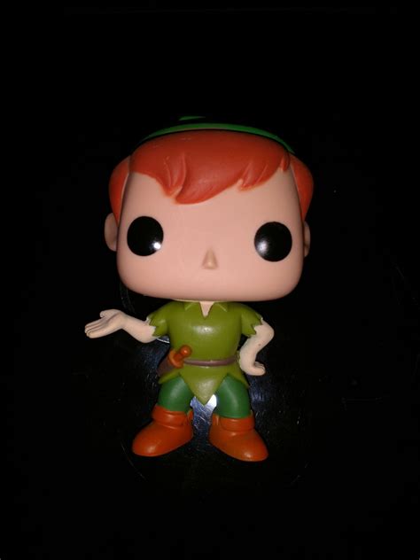 Funko Pop Peter pan from 2012 This pop is vaulted and hard to find. I'm ...