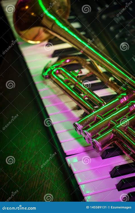 Old Trumpet Piano Keyboard stock image. Image of musical - 145589131