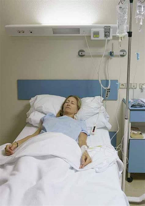 Woman Sedated In Hospital Bed Photograph by Ken Welsh - Pixels