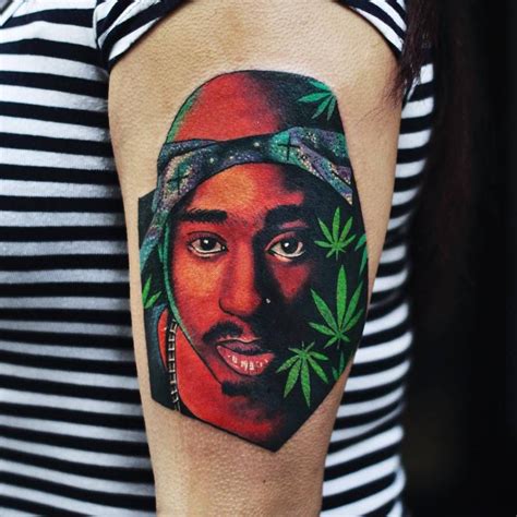 Psychedelic style Tupac portrait tattoo on the left upper arm. 2pac ...