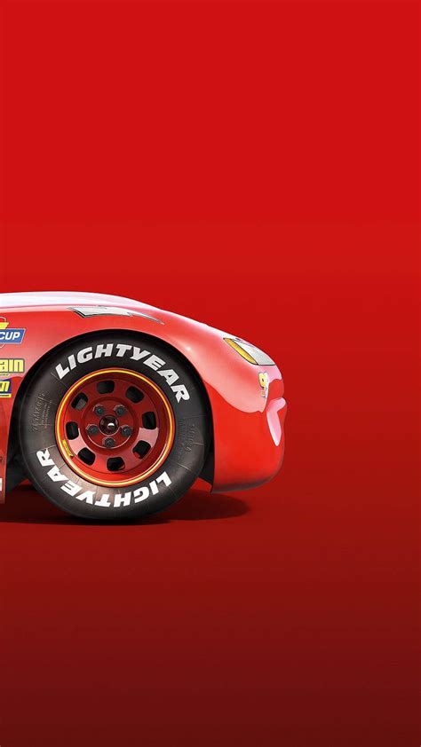 Download Lightning McQueen Racing on the Track Wallpaper | Wallpapers.com