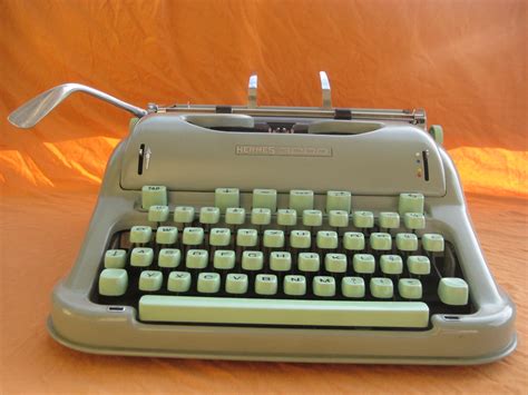 Retro Tech Geneva: Olivetti Dora Light Gray Techno Pica Typewriter (1960s)