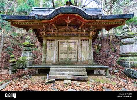 Koyasan, Okunoin cemetery, weathered wooden painted Mausoleum for Ii, chief ritual officer of ...