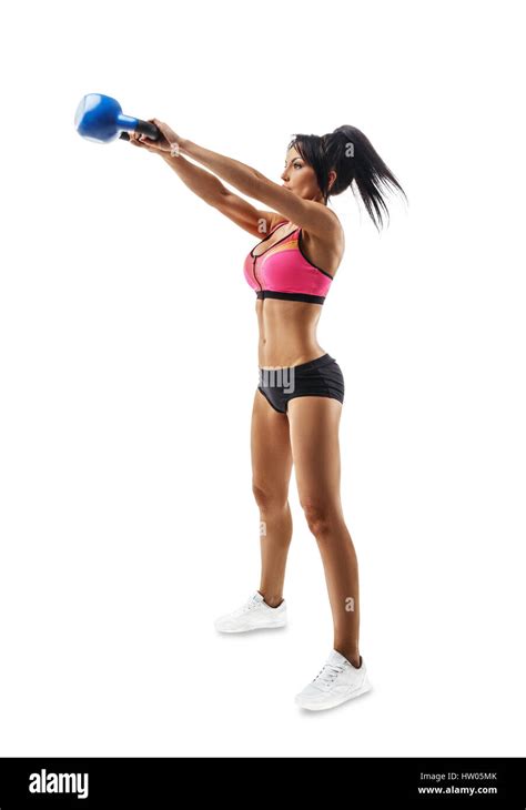 Fitness woman do kettlebell swing and kettlebell snatch. Crossfit training. Isolated on white ...