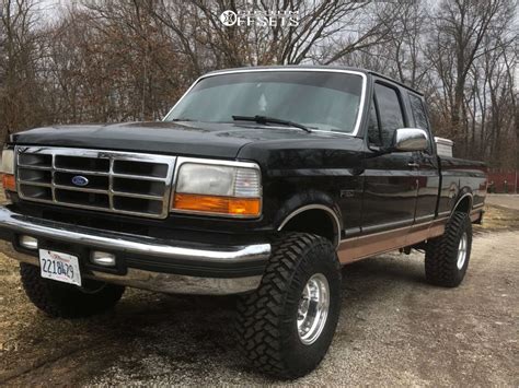 1995 Ford F-150 with 15x10 -47 Pro Comp 69 and 33/12.5R15 Nitto Trail Grappler and Suspension ...