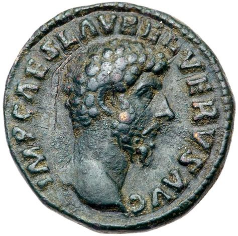 an ancient roman coin with a woman's head on it