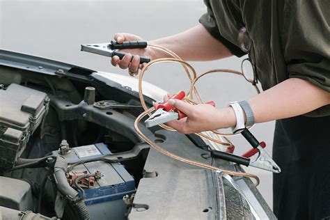 How to Charge a Dead Car Battery Using Jumper Cables - Zore’s Towing ...