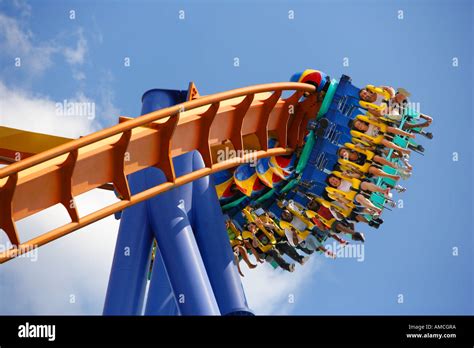 Hanging Ten Roller Coaster Ride at Theme Park Stock Photo - Alamy