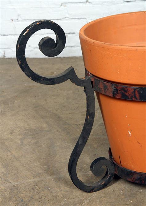 Lot - PAIR WROUGHT IRON PLANT STANDS WITH POTS