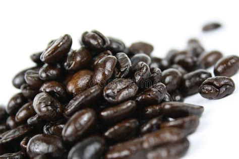 Dark roast coffee beans stock image. Image of pile, roasted - 14400511