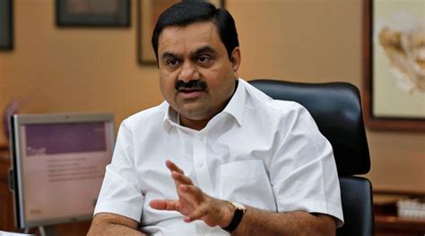 India vibrant democracy.. emerging superpower.. Adani draping itself in flag while looting ...