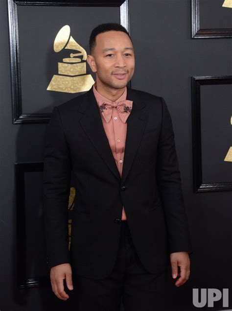 Photo: John Legend arrives for the 59th annual Grammy Awards in Los Angeles - LAP201702121218 ...