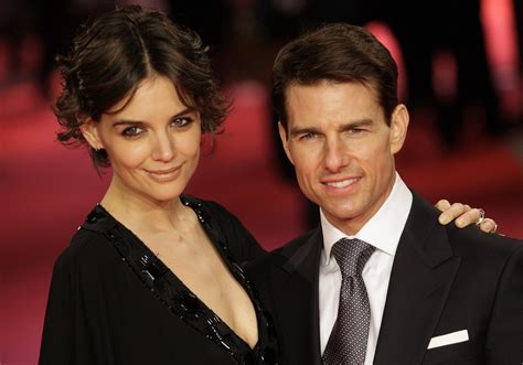 U.S. actor Tom Cruise and his wife Katie Holmes pose on the red carped ...