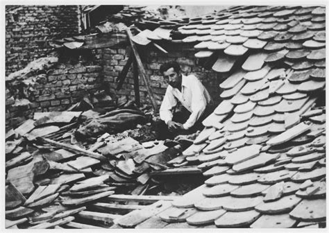 A male survivor of the Jasenovac concentration camp shows where he hid in the camp prior to his ...