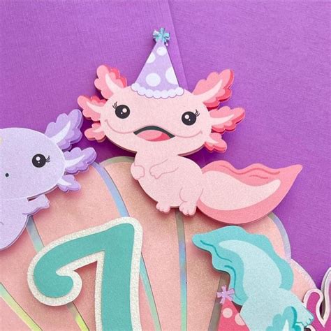 Erika | Axolotl Cake Topper🩷🩵💜🫧 . . . . . #crafts #cricutcrafts #smallbusiness #centerpieces # ...