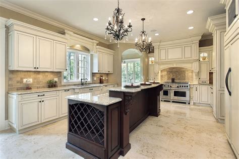 Elegant kitchen with white kitchen cabinets and espresso island Quartz ...