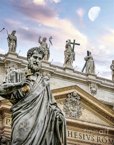 Statue of St Peter holding the key to the gates of heaven in front of ...