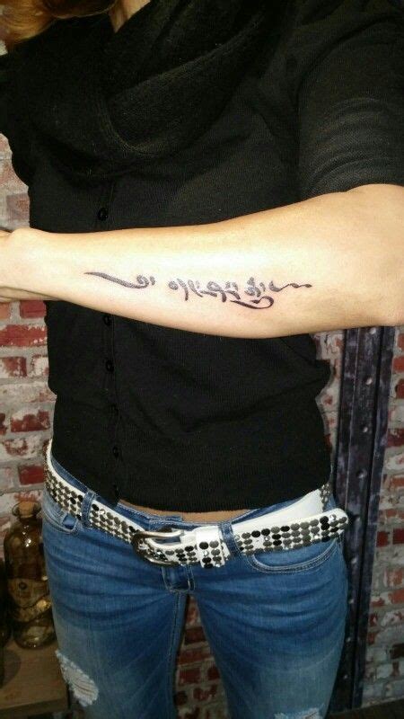 Tibetan script tattoo arm Everything Happens for a Reason | Tattoo ...