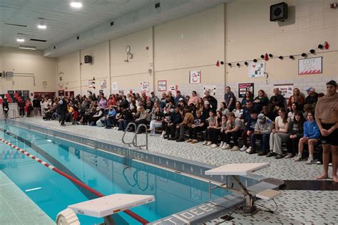 Bombers honor seniors, Navy SEAL Chris Chambers during emotional swim ...