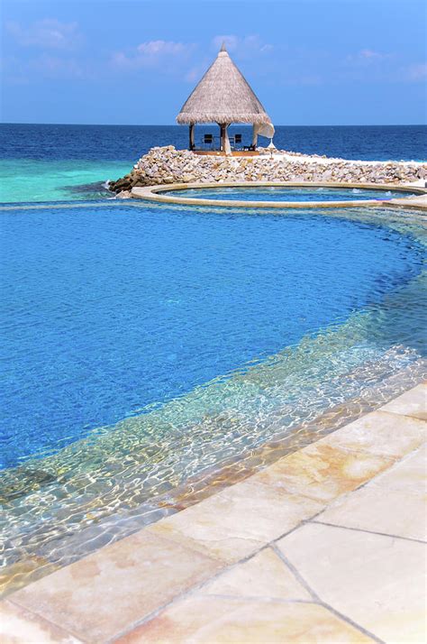 Blue Infinity Pool. Maldives 1 Photograph by Jenny Rainbow - Fine Art America