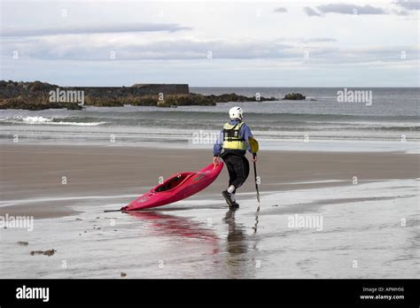 Dragging canoe hi-res stock photography and images - Alamy