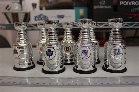 Lot of Mini Replica Stanley Cups (8)