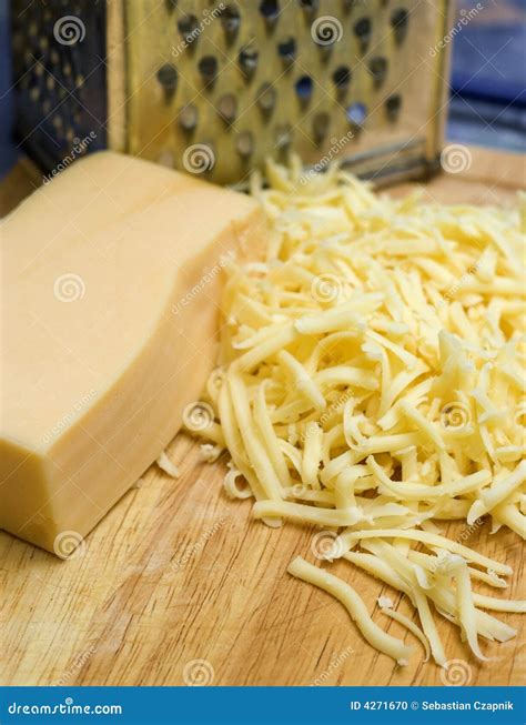 Grating cheese stock photo. Image of grate, hunk, board - 4271670