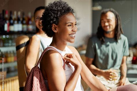 Laughing woman and friends in a cafe after the gym Stock Photo | Adobe ...