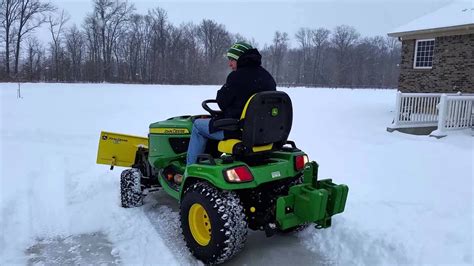 John Deere X758 Plowing Snow - YouTube