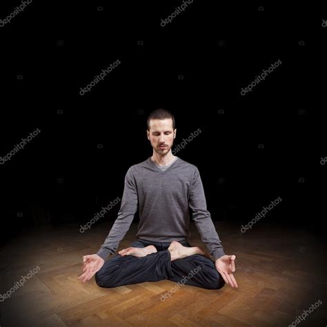 Young man meditating in yoga position, meditation — Stock Photo © tommasolizzul #28461079