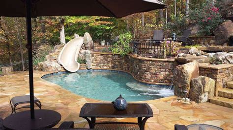 Outdoor Living Pool WaterFall Slide - Landscaping Atlanta