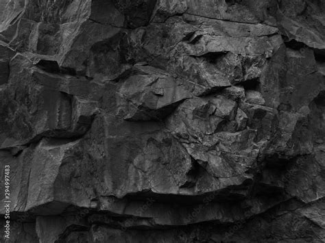 Rock texture. Dark black grunge stone texture background. Fragment of a ...