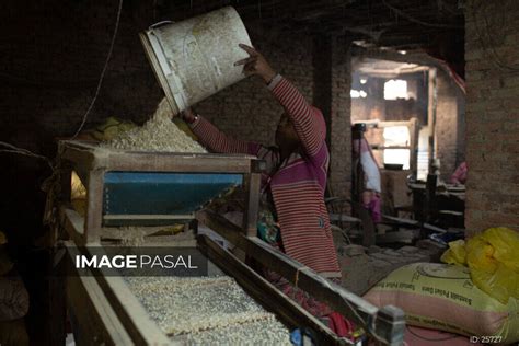 Beaten Rice Making Process - buy images of Nepal, stock photography Nepal