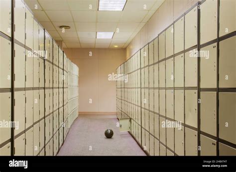 Empty locker room, gym facilities, lockers and sports ball Stock Photo - Alamy