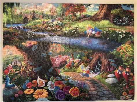 Thomas Kinkade Alice in Wonderland 750 pieces : r/Jigsawpuzzles